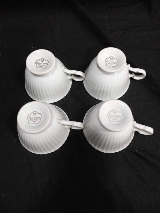 Bundle of 7 Wedgwood Bone China Plates w/ 4 Matching Tea Cups, Cream and Sugar Dish image number 3