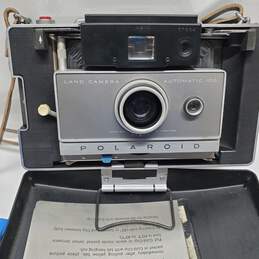 Polaroid Land Camera Automatic 100 with Case and Accessories Flash Bulbs Etc alternative image