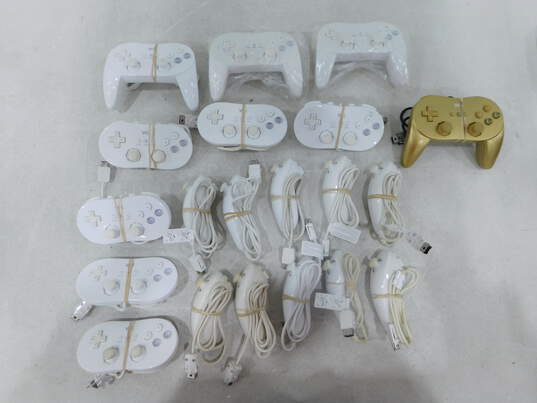 10 Nintendo Wii Nunchuck Controllers + 10 Wii Classic/ Pro Controllers image number 1