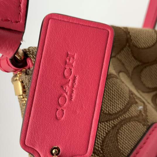 Womens Brown Pink Signature Print Bag Charm Crossbody Strap Satchel Handbag image number 6