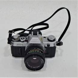 Canon AE-1 SLR 35mm Film Camera With Lens & Manual alternative image