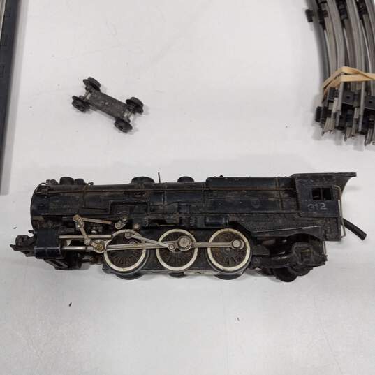 Louis Marx Vintage Train Set  Engine / 4 Cars & Track image number 3