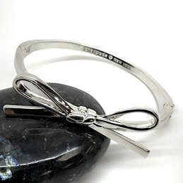 Designer Kate Spade Silver-Tone Bow Hinged Bangle Bracelet With Dust Bag