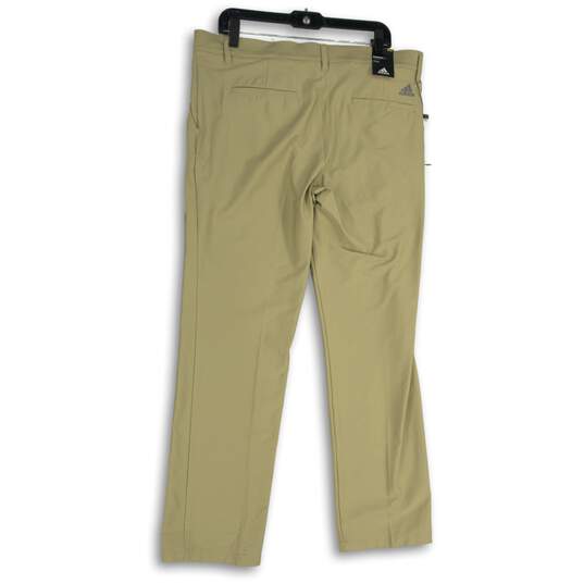 NWT Mens Tan Flat Front Slash Pocket Ultimate Classic Golf Chino Pants Sz 35x32 image number 2