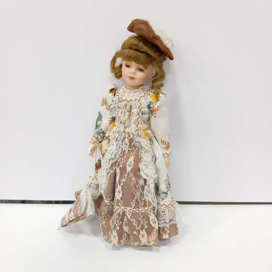 Porcelain Doll w/ Floral Lace Outfit image number 1