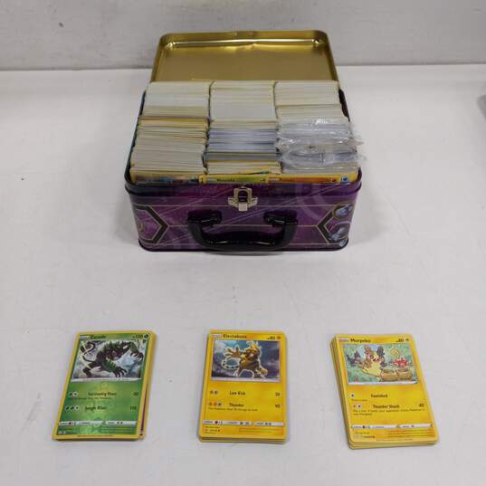 Lunch Box Full of Pokemon Cards image number 1