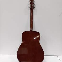 Brown Acoustic Guitar alternative image
