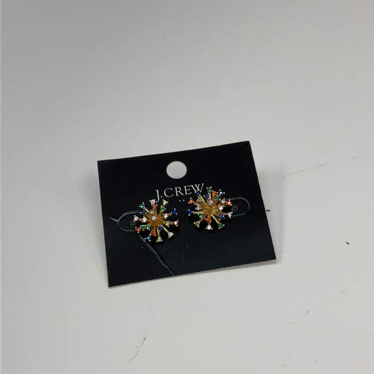 Designer J. Crew Gold-Tone Snowflake Multicolor Rhinestone Stud Earrings image number 2