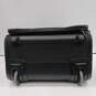 Tumi Black Ballistic Rolling Carry-On Luggage image number 4