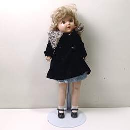 Antique Porcelain Doll In Black Dress