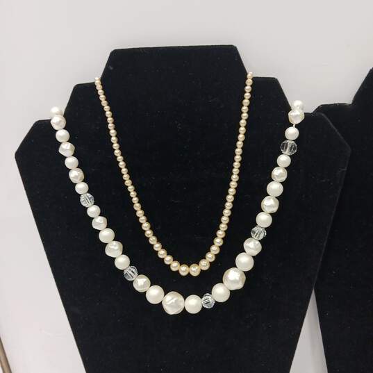 Assorted Faux Pearl And Metal Themed Costume Jewelry Pieces image number 5