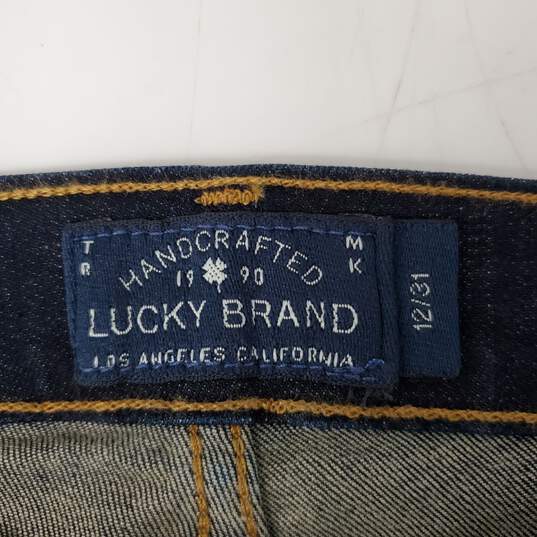 NWT Lucky Brand WM's Dark Wash Blue Wide Flare Jeans Size 12 x 31 image number 3