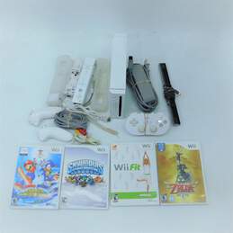 Nintendo Wii Gaming Console W/ 4 Games In Cases & Accessories