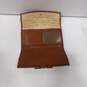 Pair of Dooney and Bourke Leather Unisex Wallets image number 3