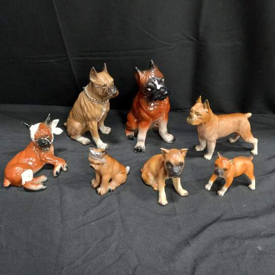 Bundle of 7 Assorted Ceramic Dog Figurines image number 1
