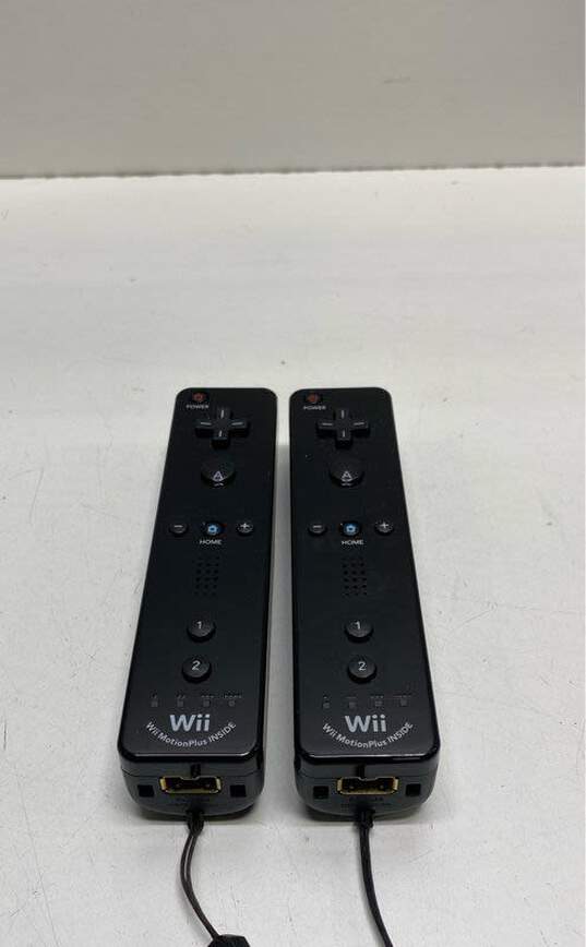 Set Of 2 Nintendo Wii Motion Plus Remotes- Black image number 1