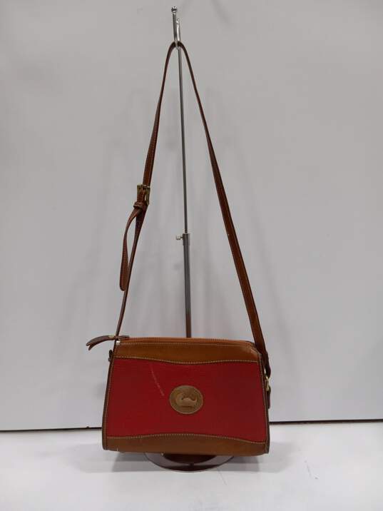 Dooney & Bourke Red/Brown Pebble Leather Crossbody Bag image number 1
