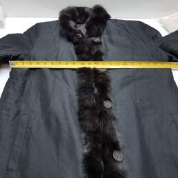 Women's long black overcoat with faux fur trim alternative image