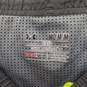 UNDER ARMOUR FITTED HEAT GEAR GREY AND GREEN SHORTS SIZE M image number 4