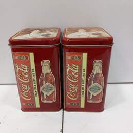 Pair of The Palms Coca Cola Tins