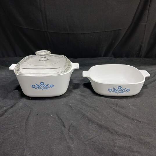 Pair of White Corning Ware Dishes w/ 1 Lid image number 1