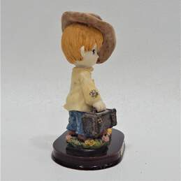 Precious Moments Belle & Benny brown haired boy with dog and brown hat figurine alternative image