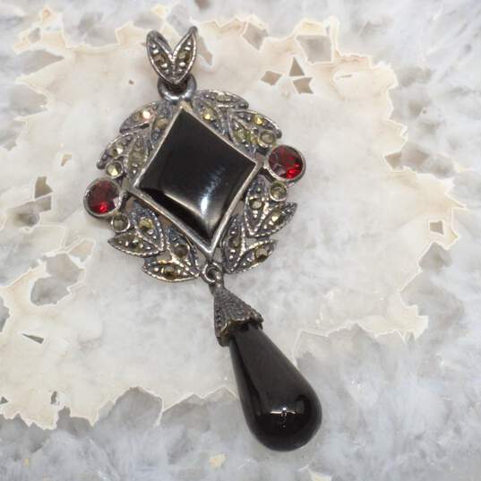 Artisan SU Sterling Silver Onyx And Garnet Pendant image number 1