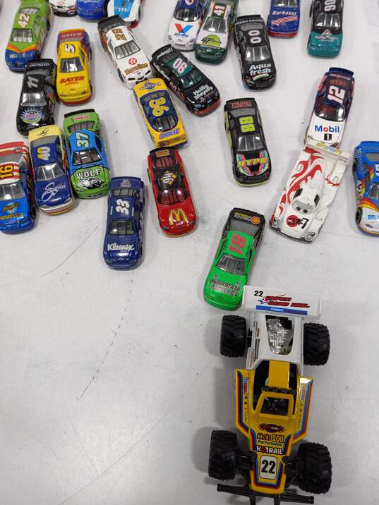6LB Bulk Lot of Assorted Toy Cars, Stands, & Trading Cards image number 5