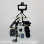 Camera accessories lot - mini tripods mounts SD card image number 1