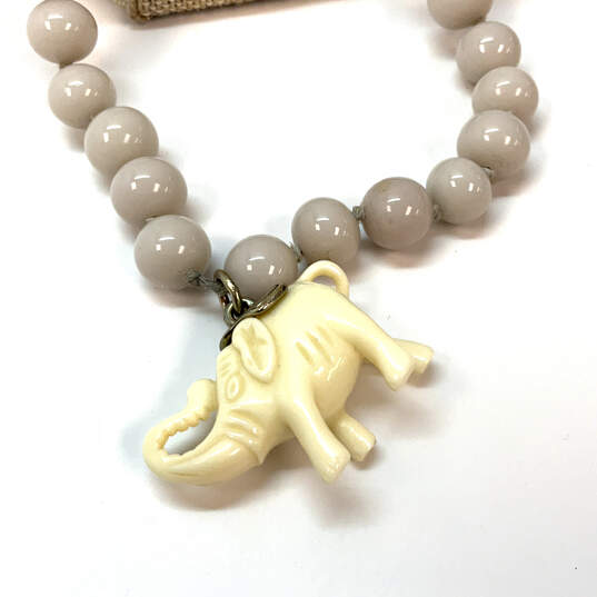 Designer J. Crew Gold-Tone Faux Pearl Elephant Beaded Pendant Necklace image number 4
