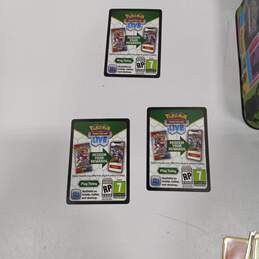Bundle of Assorted Nintendo Pokemon Trading Cards In Tin Case alternative image