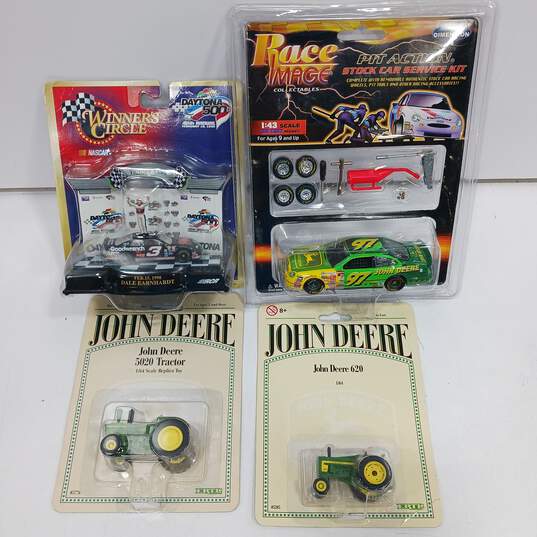 4 Collector Vehicles in Original Packages image number 1