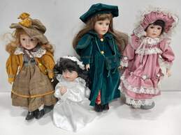 Bundle of 4 Assorted Porcelain Dolls