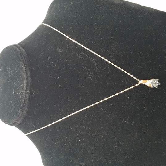 A.O. 10k Gold Diamond Blue Topaz Cluster Flower Pendant Necklace 2.6g image number 1