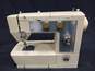 Montgomery Ward Sewing Machine Model No. UHT J1460 in Leather Case image number 3