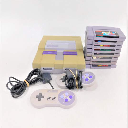 Nintendo SNES w/ 8 games image number 1