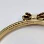 Designer Kate Spade Gold-Tone Bow Tie Band Bangle Bracelet 20.6g image number 4