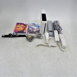 Nintendo Wii W/ Two Controllers, 2 Games, & One Nunchuck