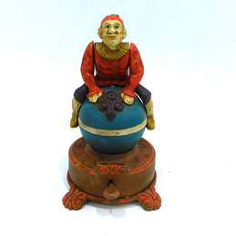 Vintage Repro Cast Iron Spinning Hand Stand Clown On Globe Mechanical Coin Bank