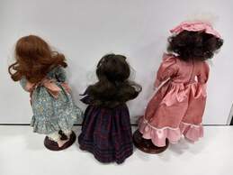 Bundle of 3 Assorted Vintage Girl Porcelain Collector Dolls with Display Stands alternative image