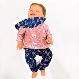 Realistic Closed Eyes Smiling Baby Doll