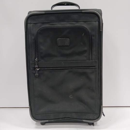 Tumi Black Ballistic Rolling Carry-On Luggage image number 1