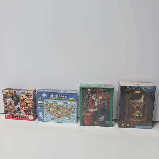 4pc Lot of Assorted Family Jigsaw Puzzles NIB image number 1