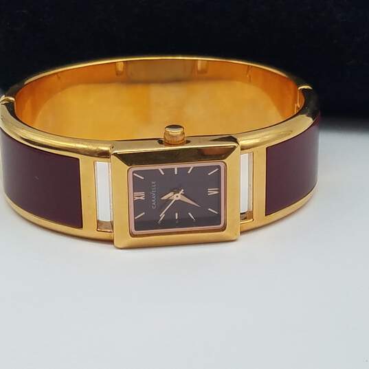 Caravelle By Bulova 44L141 C4343039 B4 20mm WR Purple Dial Bangle Watch image number 2