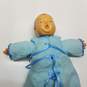 Vintage unmarked newborn baby doll in blue dress and diaper image number 3