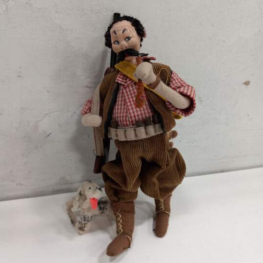 Handmade Cloth Doll of a Hunter and His Dog image number 1