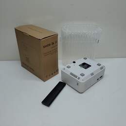 Untested LED Home Projector for Audio / Video / Picture w/ Built in Speaker IOB Listing 04 P/R alternative image