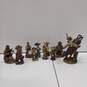 Lot Of 12 Unbranded Western Resin Figurines (11 Cowboys & 1 Native American Woman Holding Baby) image number 1
