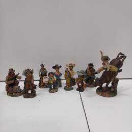 Lot Of 12 Unbranded Western Resin Figurines (11 Cowboys & 1 Native American Woman Holding Baby)