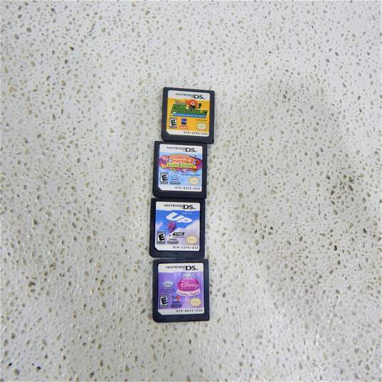 Nintendo DSI W/ Four Games Up image number 7